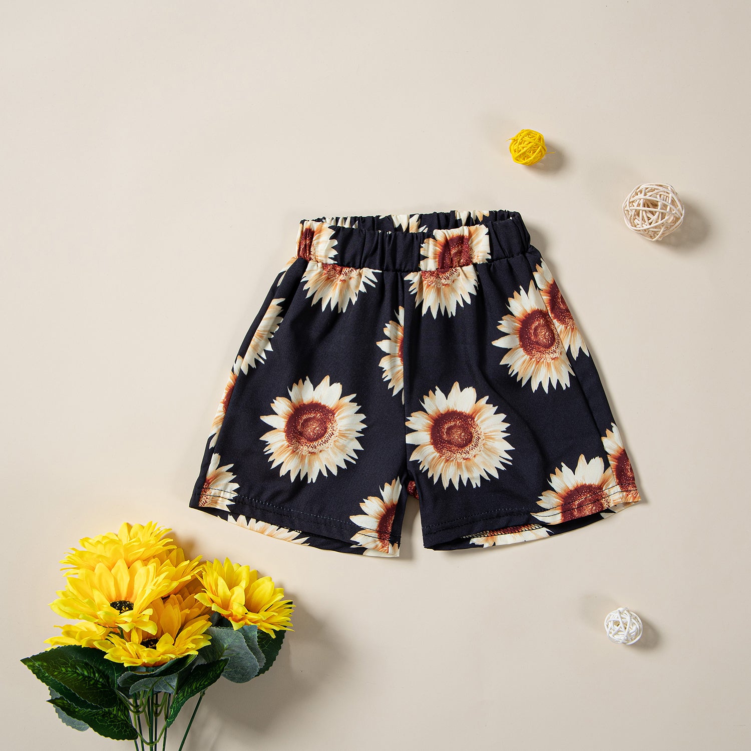 Girls Yellow & Black Off-Shoulder Smocked Top With Floral Printed Shorts