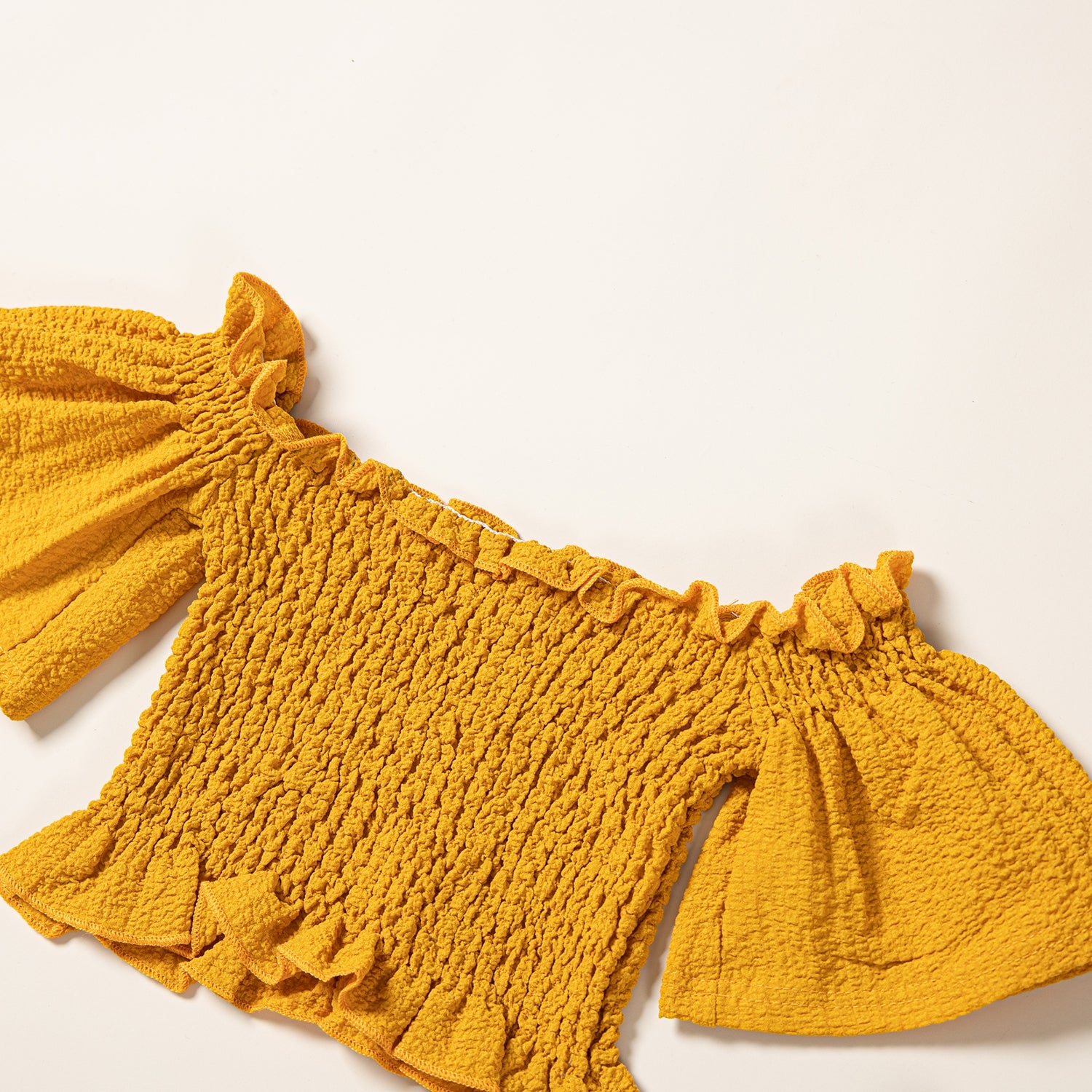 Girls Yellow & Black Off-Shoulder Smocked Top With Floral Printed Shorts