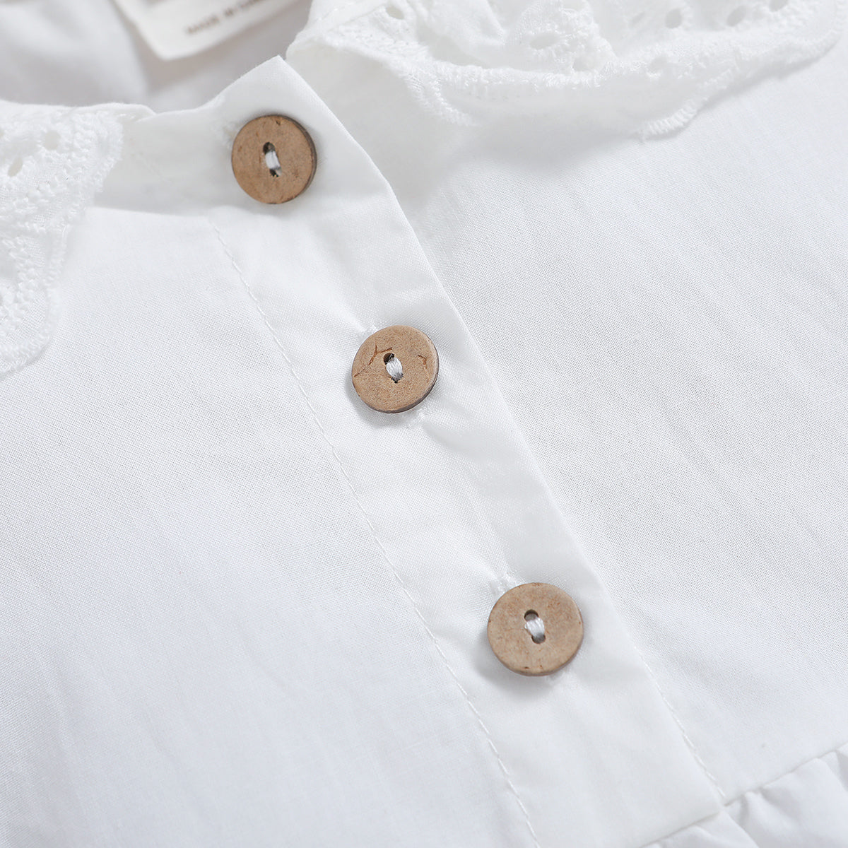 Infants Girls White Self Design Peter Pan Collar Schiffli Bodysuit