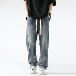 Men Relaxed Fit Mid-Rise Mildly Distressed Light Fade Jeans