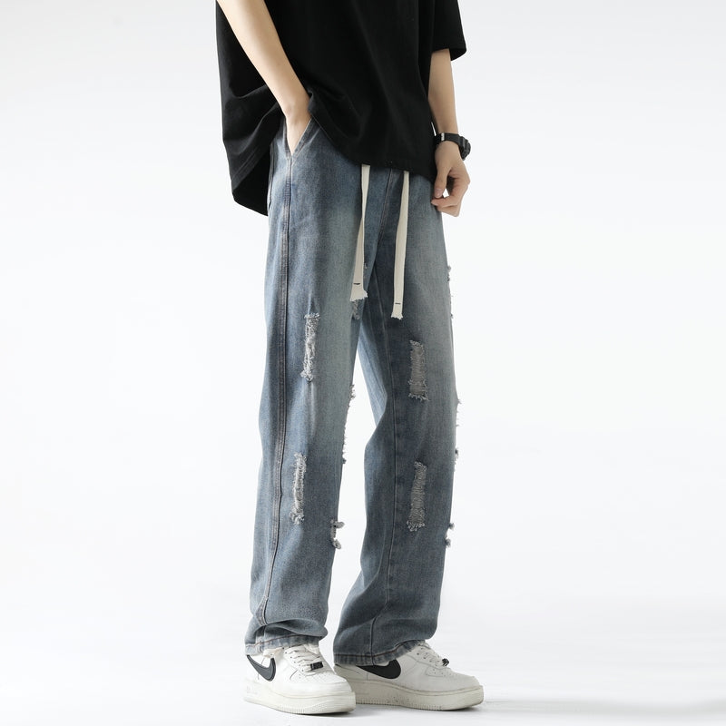 Men Relaxed Fit Mid-Rise Mildly Distressed Light Fade Jeans