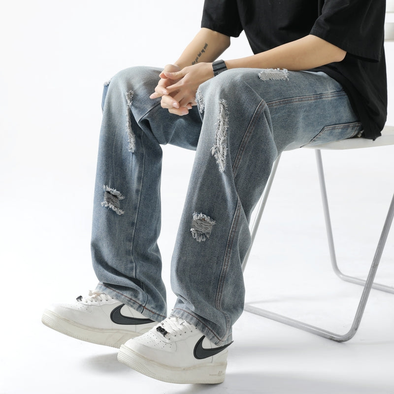Men Relaxed Fit Mid-Rise Mildly Distressed Light Fade Jeans