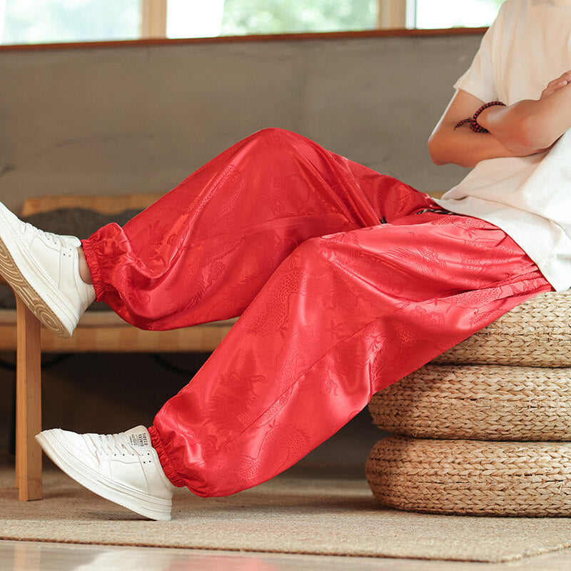 Men Self Design Loose Fit Mid-Rise Pleated Drop Crotch Trousers