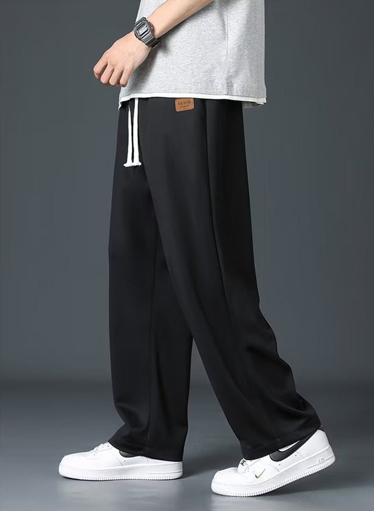 Men Loose Fit Pleated Mid-Rise Regular Trousers