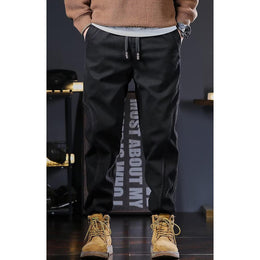 Men Solid Mid-Rise Regular Joggers