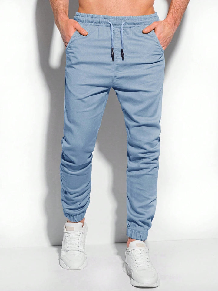 Men Solid Mid-Rise Chinos Trousers