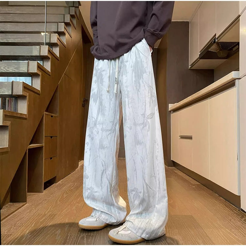 Men Abstract Printed Loose Fit Mid-Rise Regular Trousers