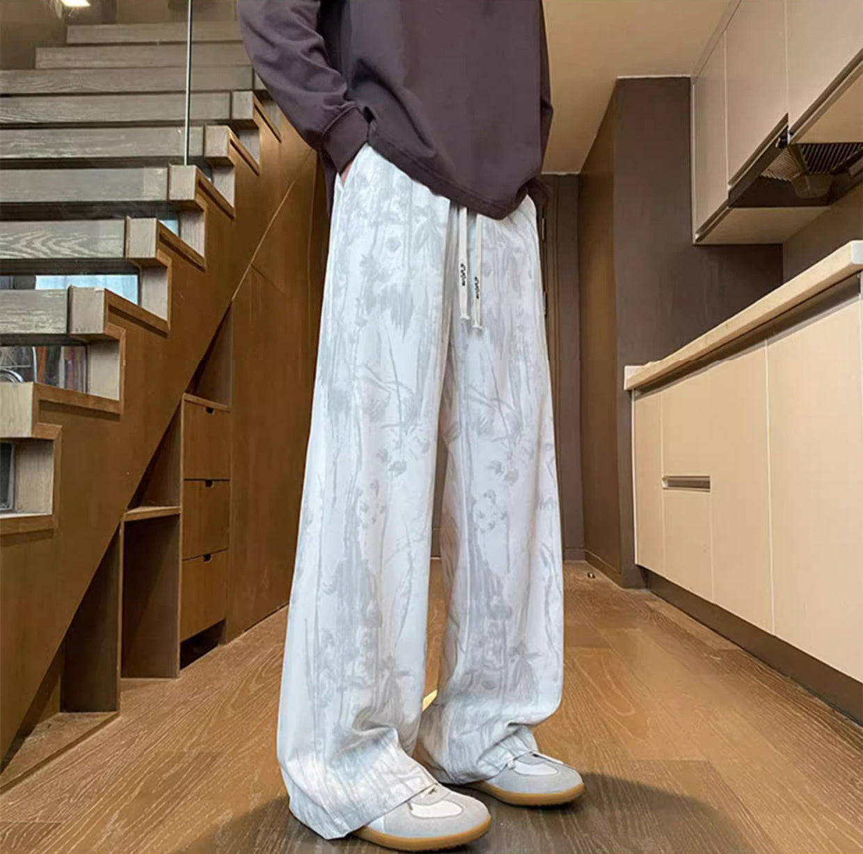 Men Abstract Printed Loose Fit Mid-Rise Regular Trousers