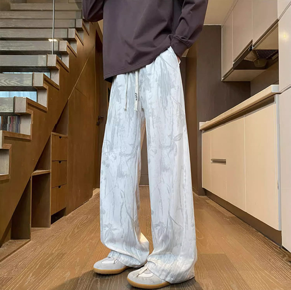 Men Abstract Printed Loose Fit Mid-Rise Regular Trousers