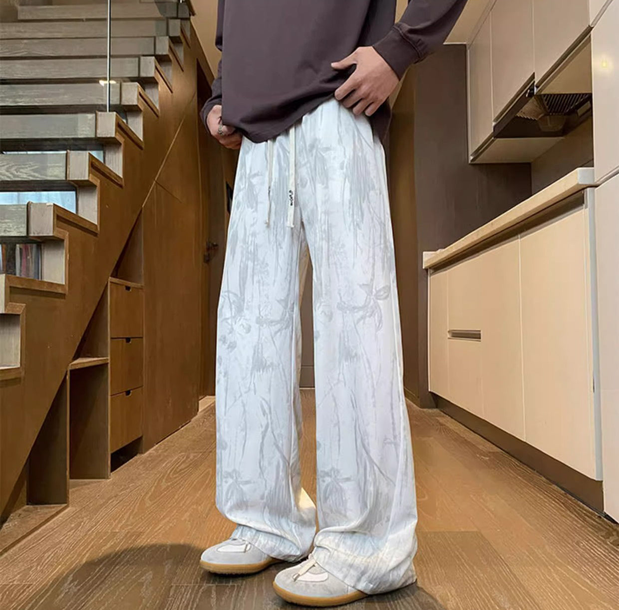 Men Abstract Printed Loose Fit Mid-Rise Regular Trousers