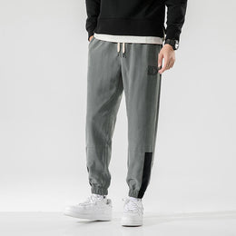 Men Easy Wash Mid-Rise Pleated Trousers