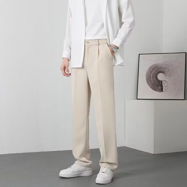Men Solid Regular Fit Mid-Rise Trousers