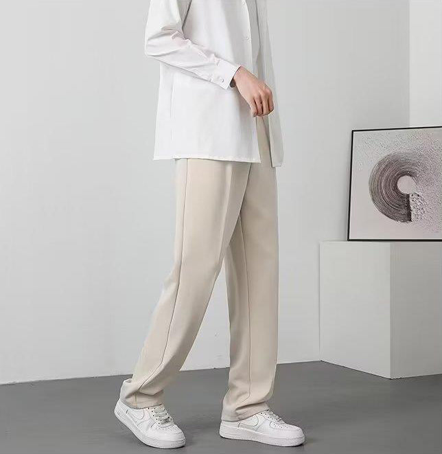 Men Solid Regular Fit Mid-Rise Trousers