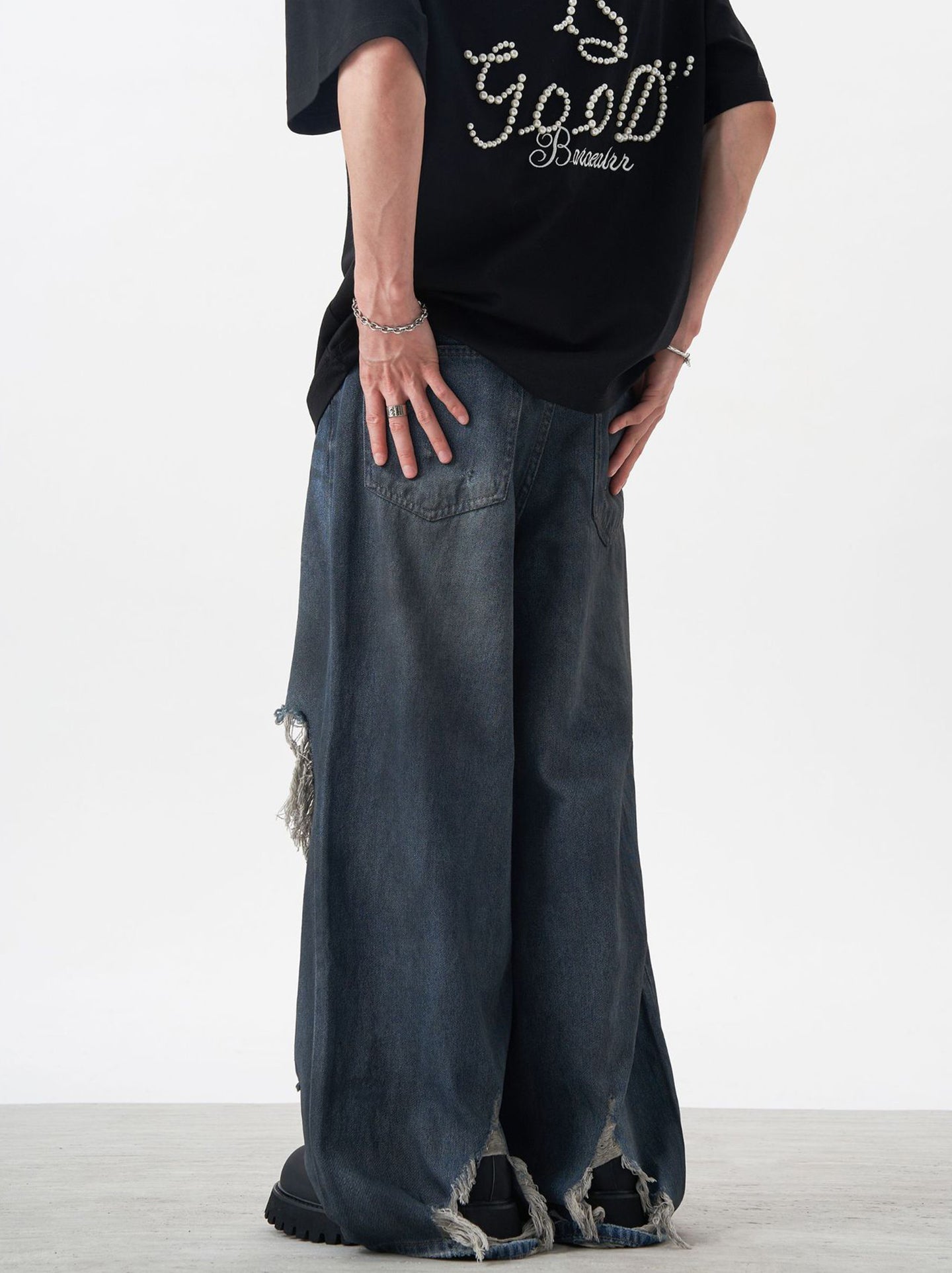 Men Flared Mildly Distressed Light Fade Jeans