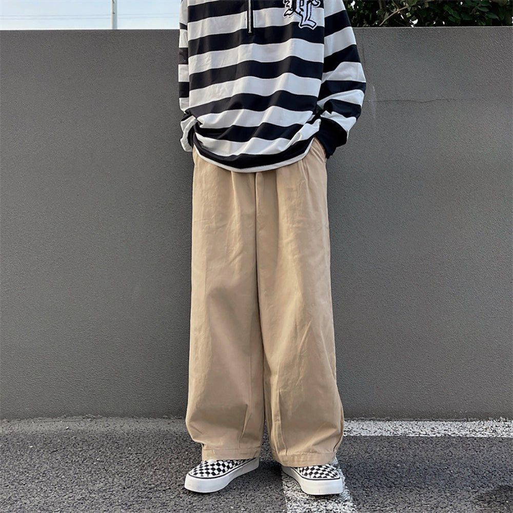 Men Solid Mid-Rise Loose Fit Easy Wash Pleated Trousers