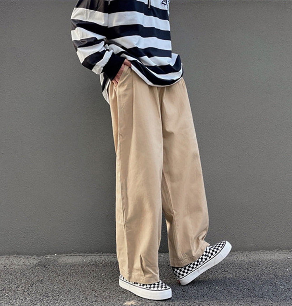 Men Solid Mid-Rise Loose Fit Easy Wash Pleated Trousers