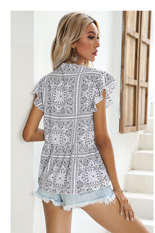 Women White & Black Printed Tie-Up Neck Peplum Top