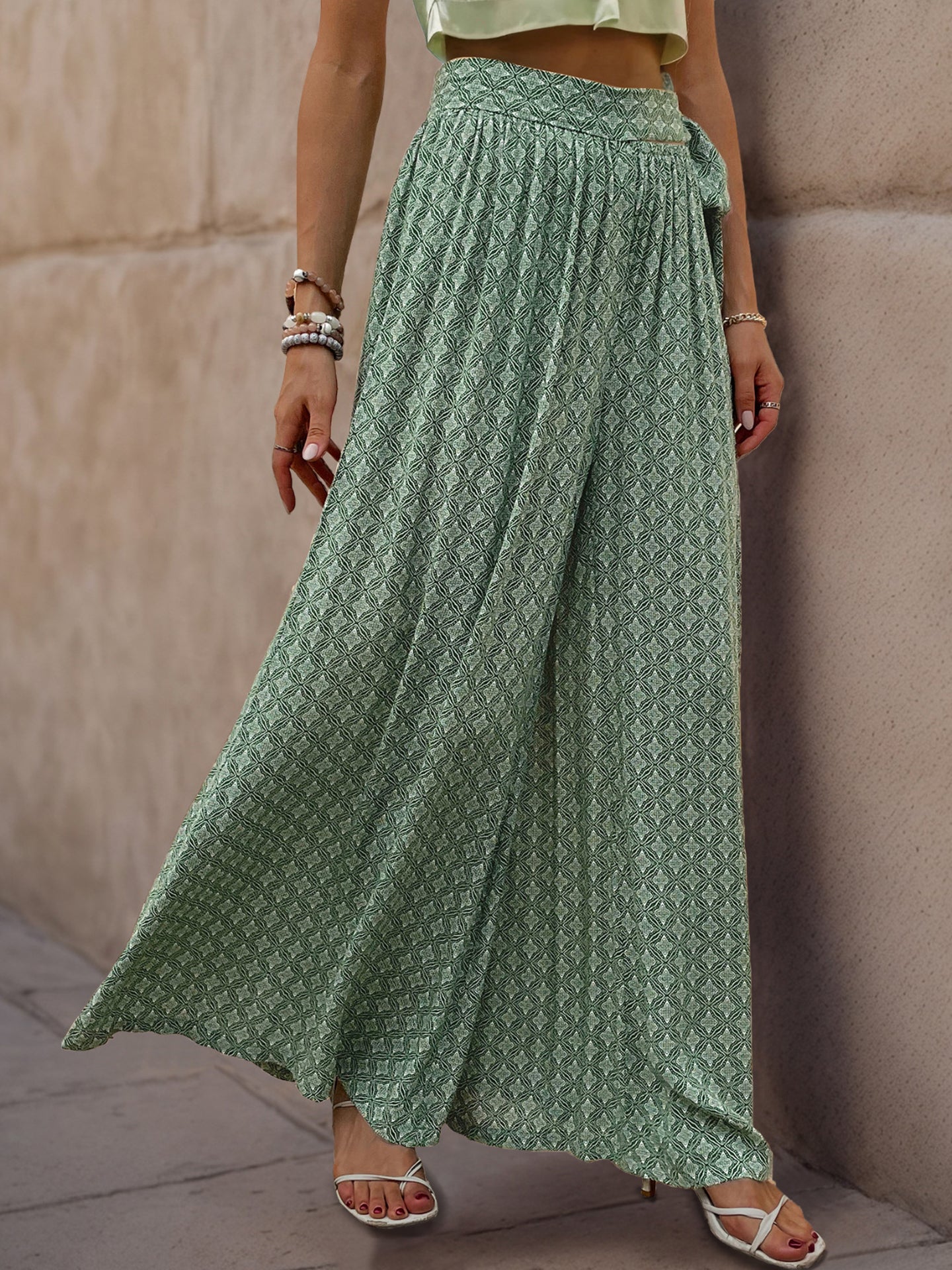 Women Ethnic Motifs Printed Flared High-Rise Easy Wash Pleated Trousers
