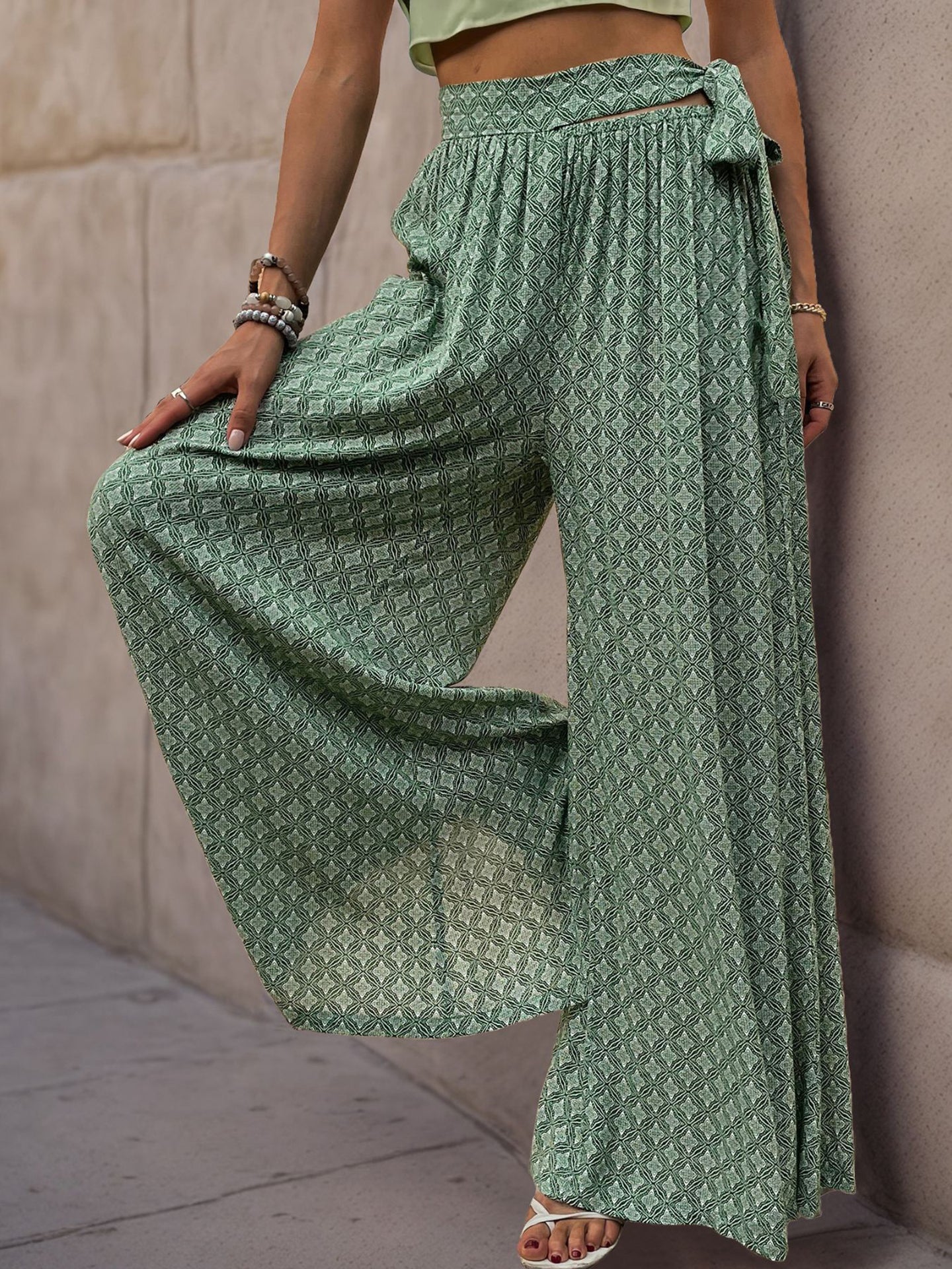 Women Ethnic Motifs Printed Flared High-Rise Easy Wash Pleated Trousers