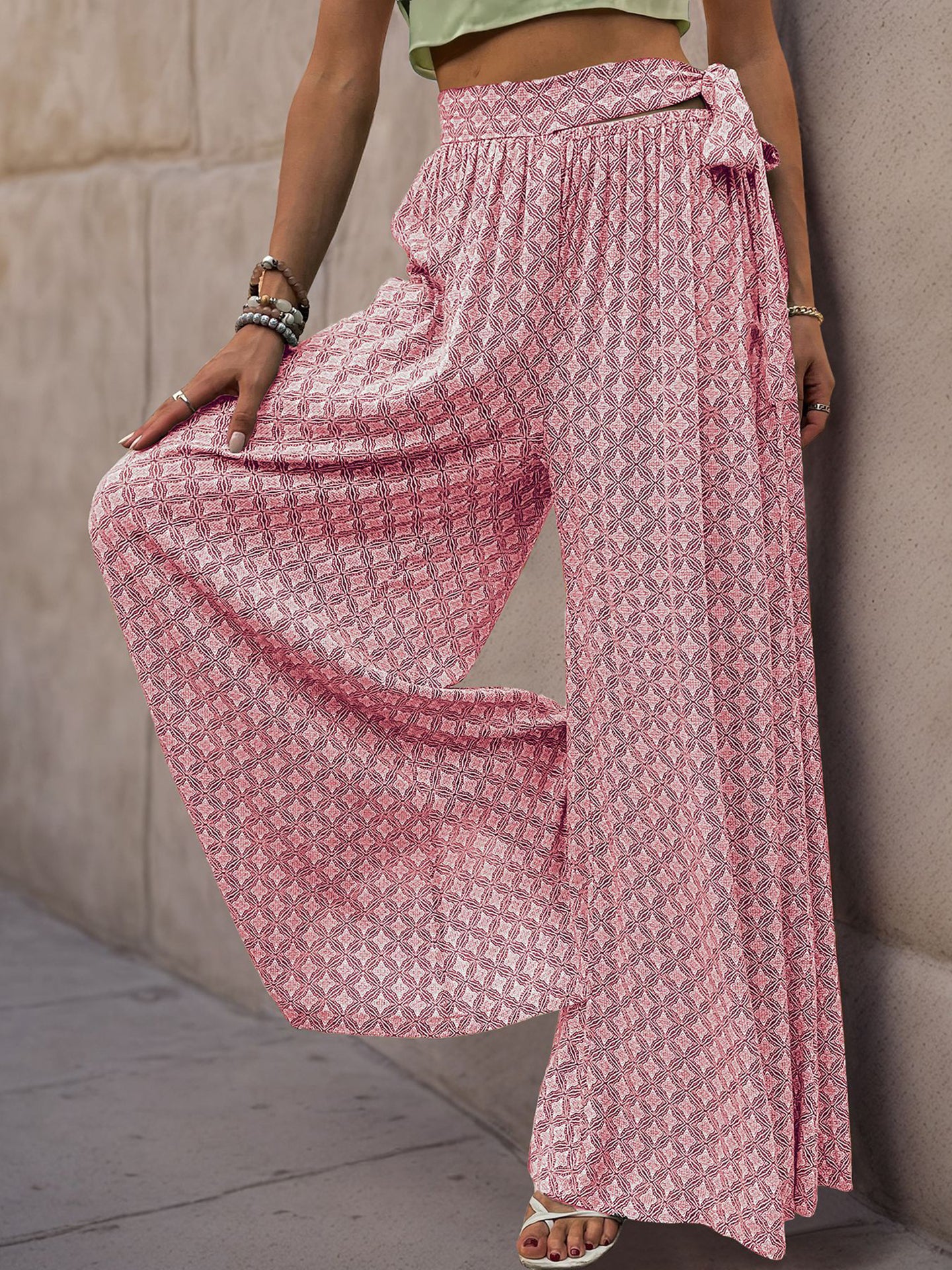 Women Ethnic Motifs Printed Flared High-Rise Easy Wash Pleated Trousers