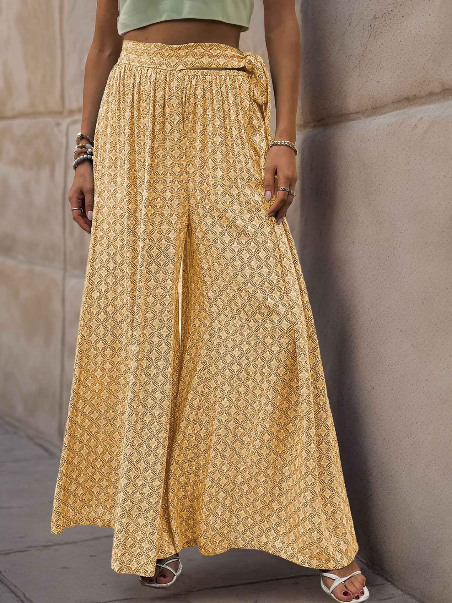 Women Ethnic Motifs Printed Flared High-Rise Easy Wash Pleated Trousers