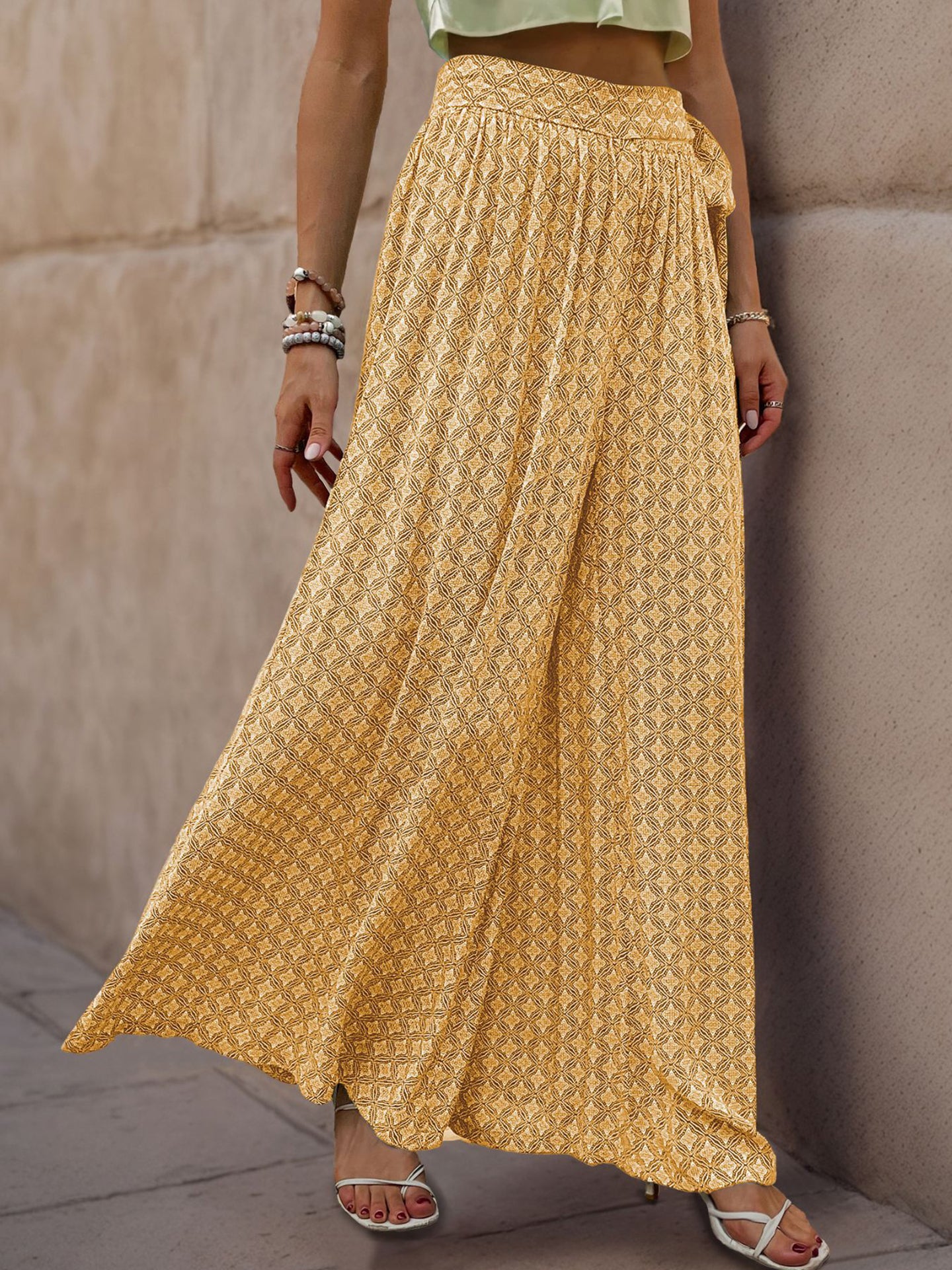 Women Ethnic Motifs Printed Flared High-Rise Easy Wash Pleated Trousers
