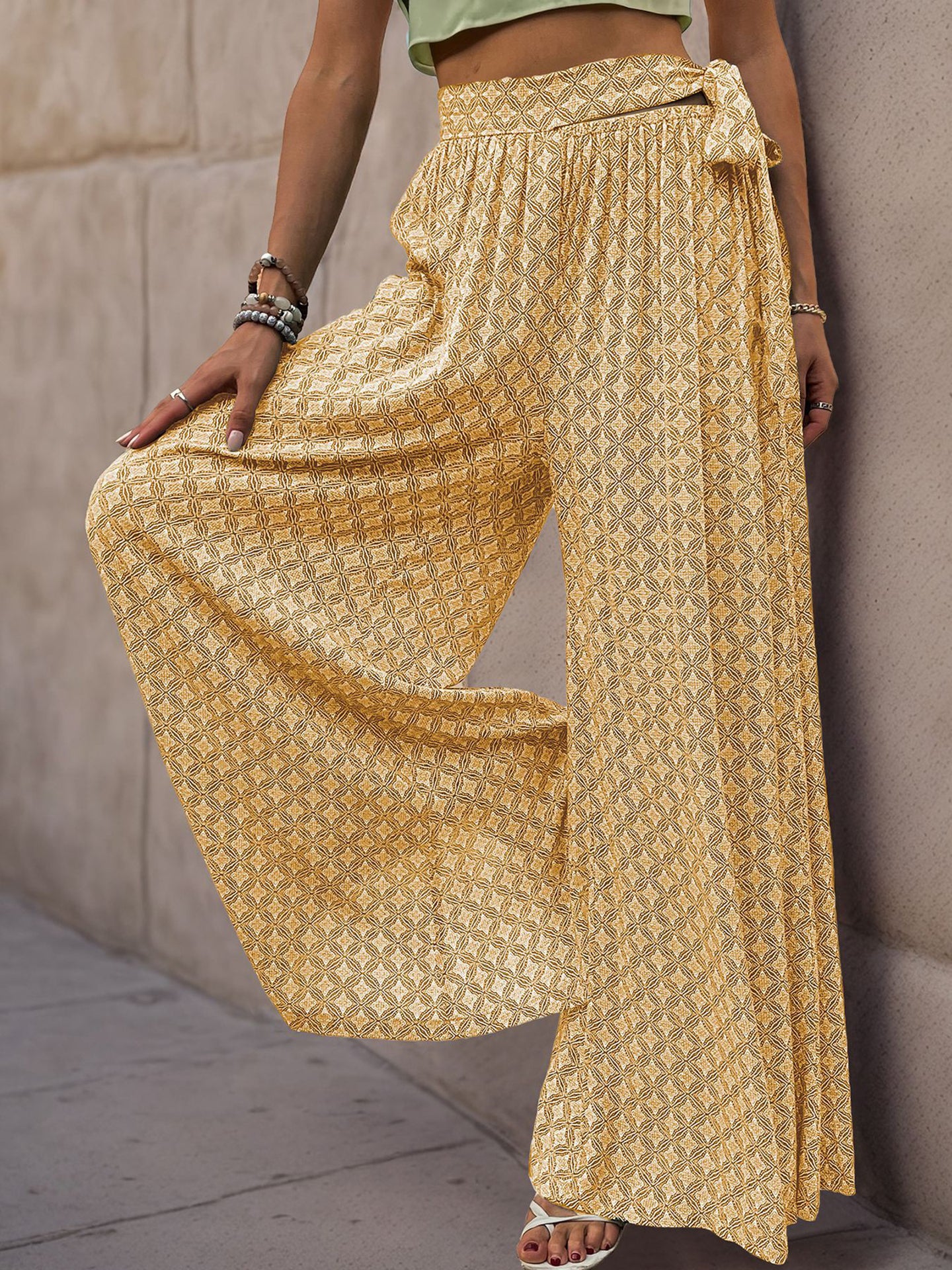 Women Ethnic Motifs Printed Flared High-Rise Easy Wash Pleated Trousers