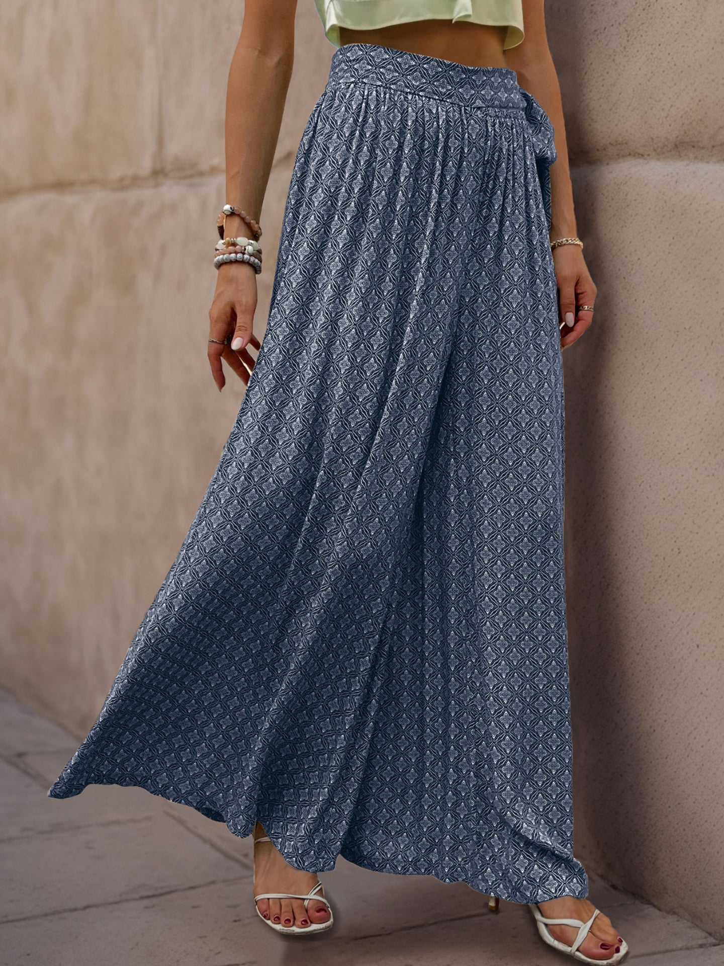 Women Ethnic Motifs Printed Flared High-Rise Easy Wash Pleated Trousers