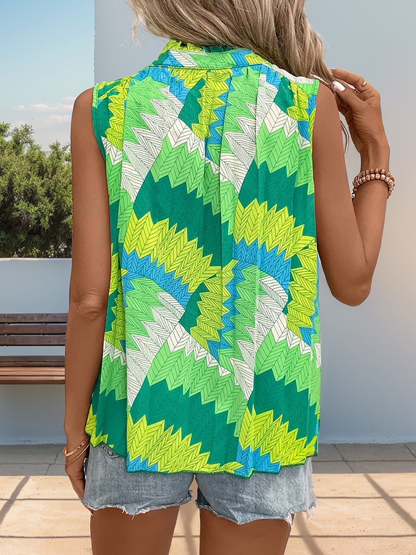 Women Abstract Printed Tie-Up Neck Top