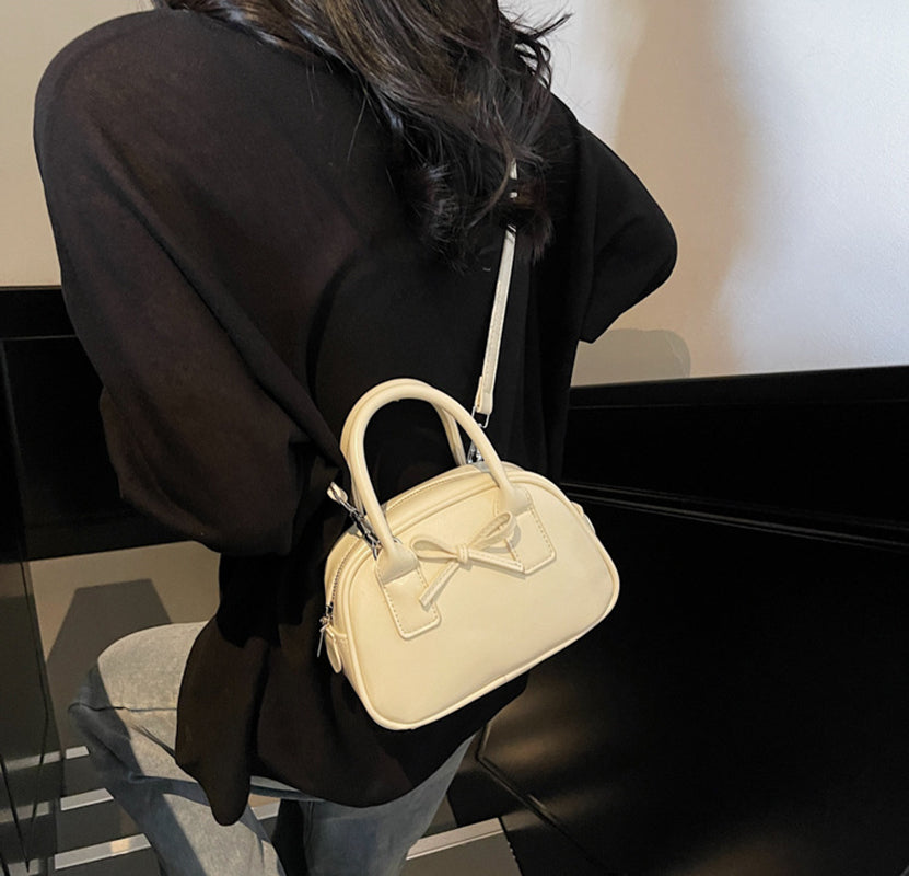 Off White Solid Two Handles Sling Bag