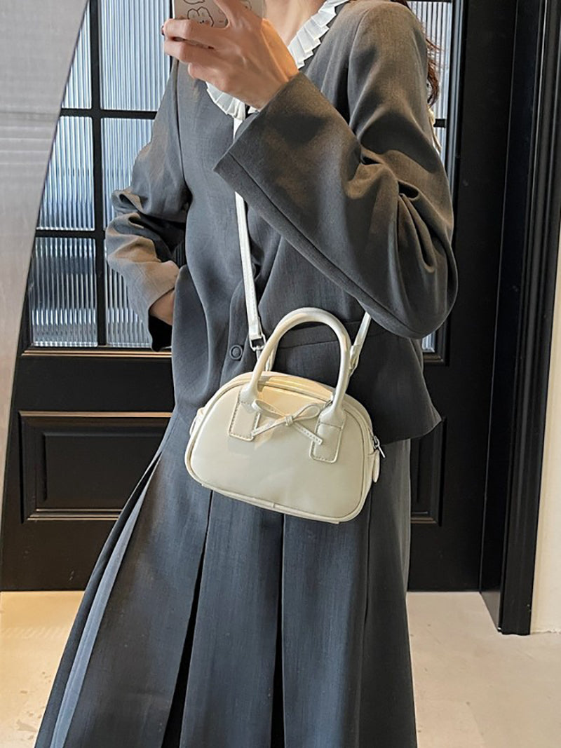 Off White Solid Two Handles Sling Bag