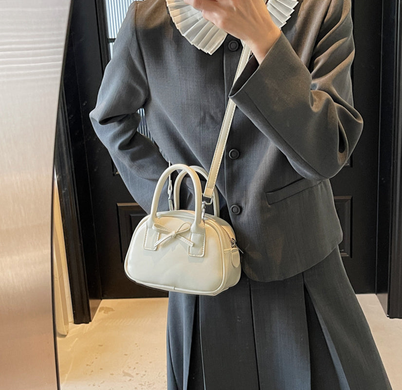 Off White Solid Two Handles Sling Bag