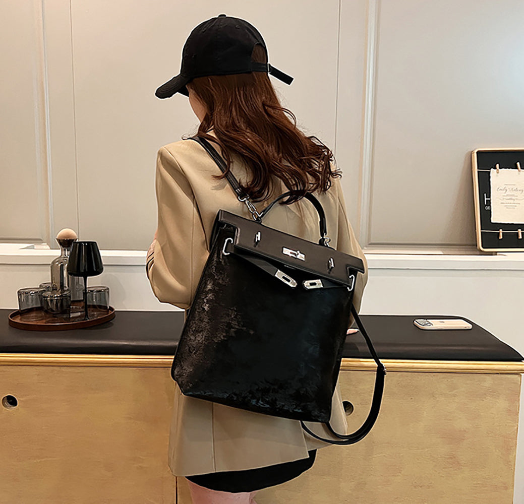 Women Solid Structured Handheld Bag