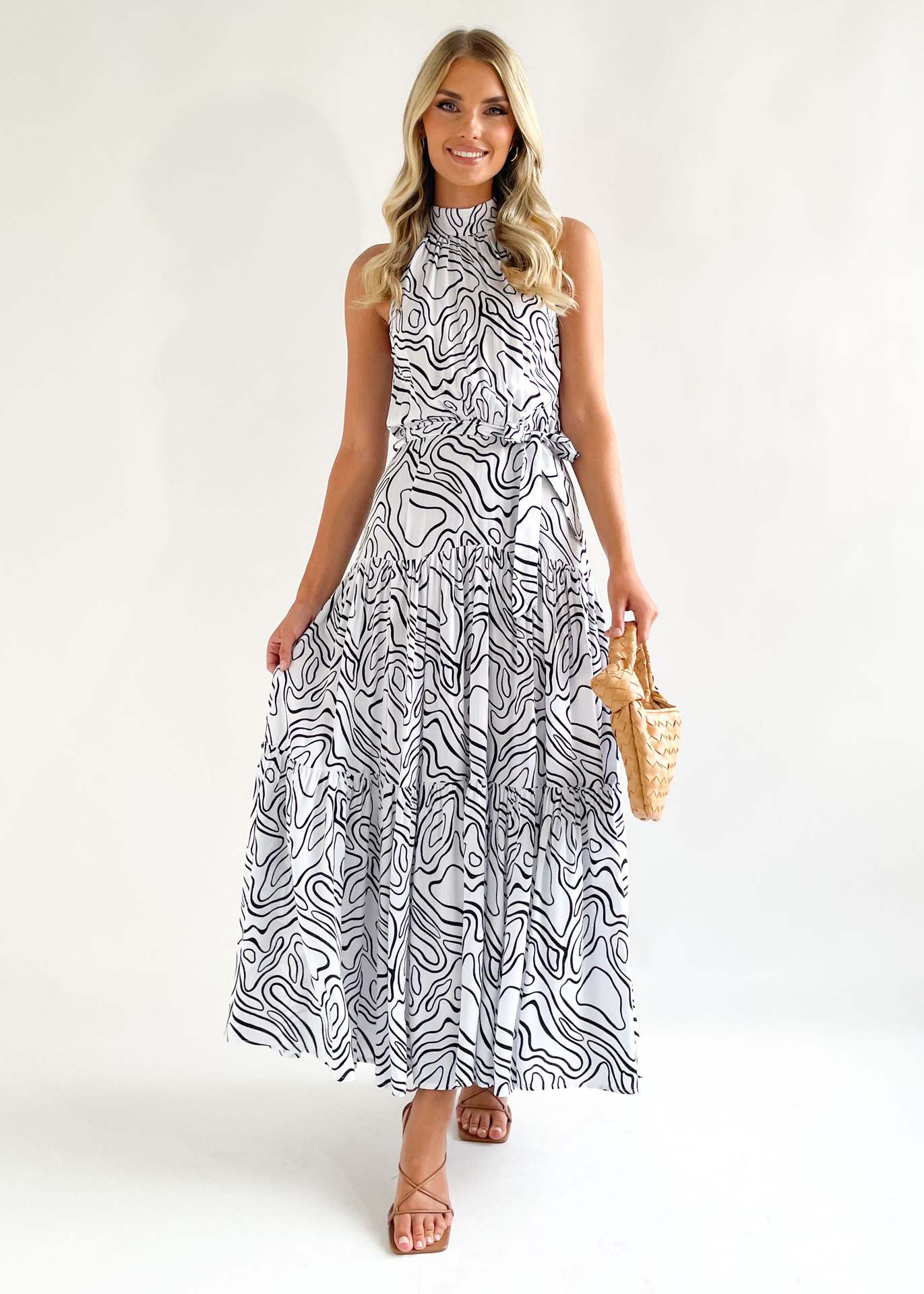 White & Black Abstract Printed Halter Neck Tiered Maxi Fit & Flare Dress