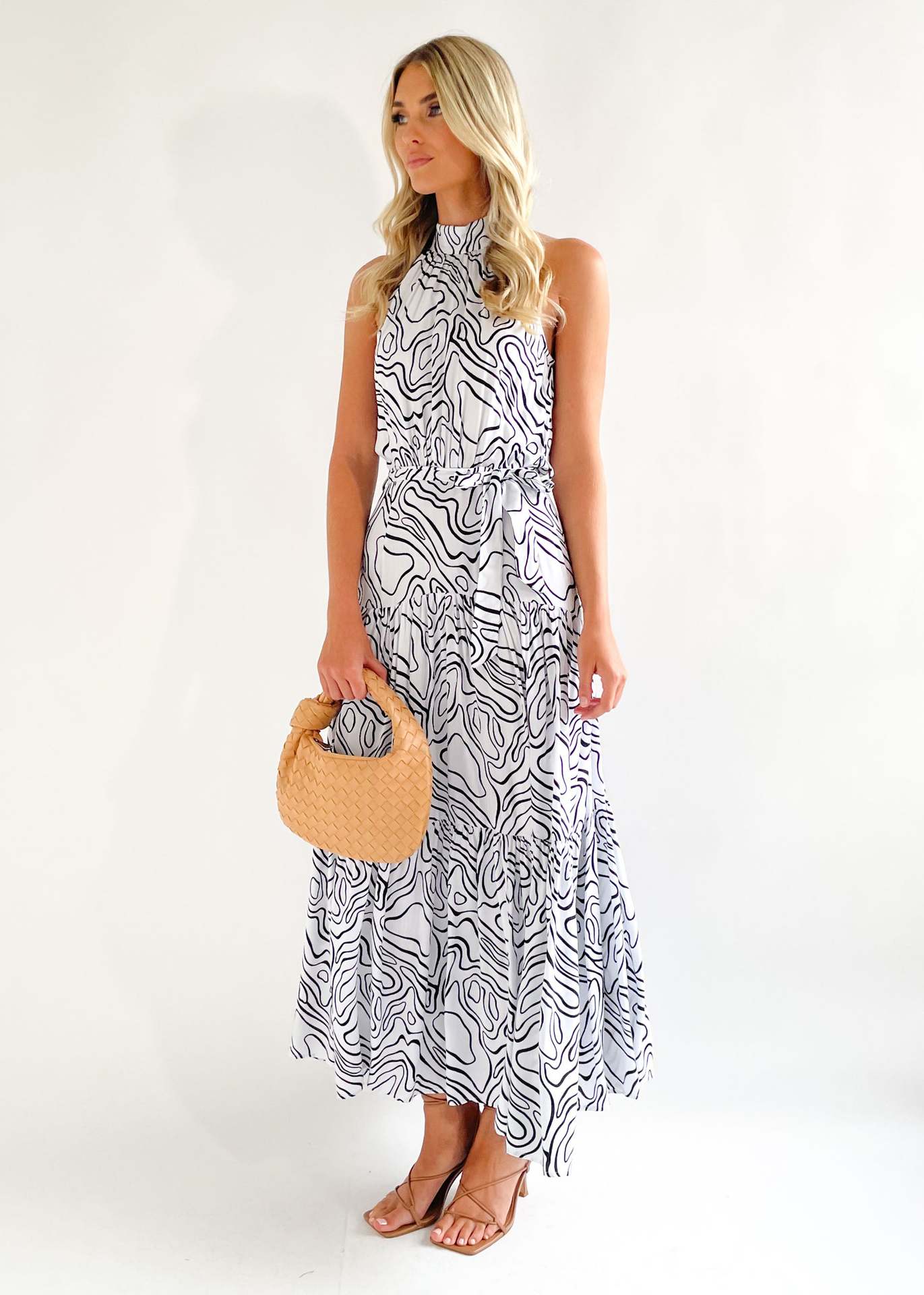White & Black Abstract Printed Halter Neck Tiered Maxi Fit & Flare Dress