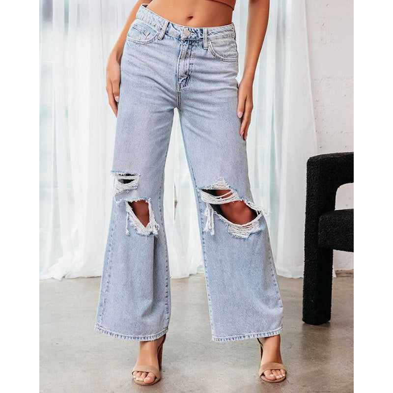 Women Blue Bootcut Highly Distressed Mid-Rise Stretchable Jeans