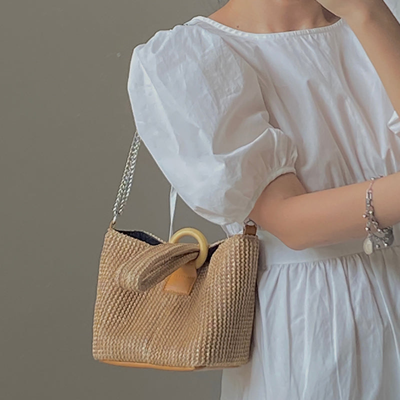 Textured Sling Bag with Tasselled