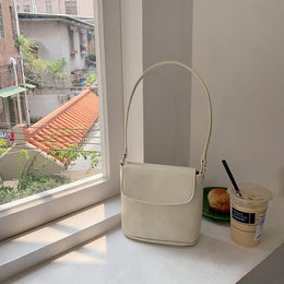 Off White Solid One Handle Sling Bag