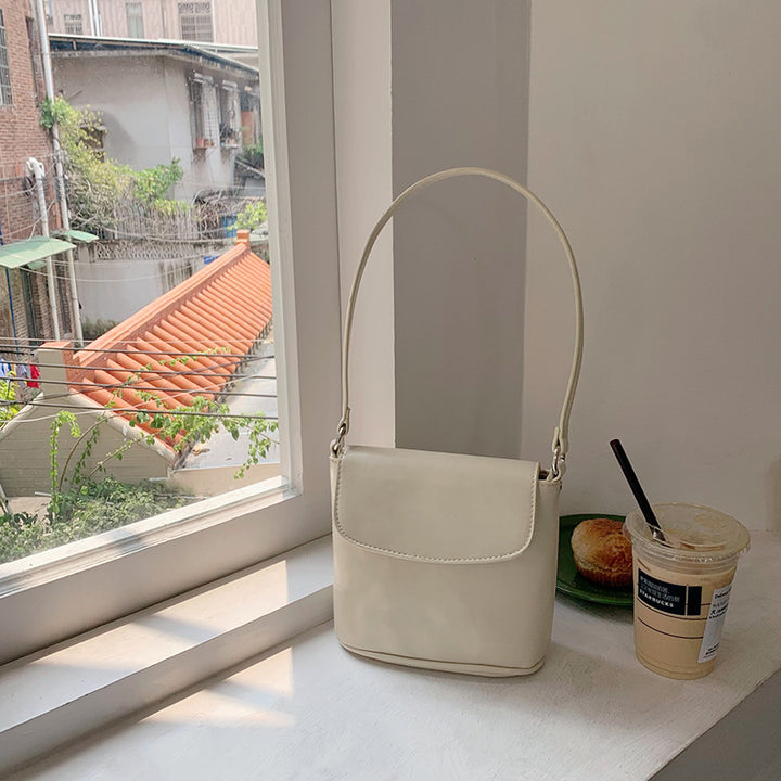 Off White Solid One Handle Sling Bag