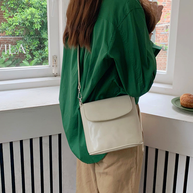 Off White Solid One Handle Sling Bag