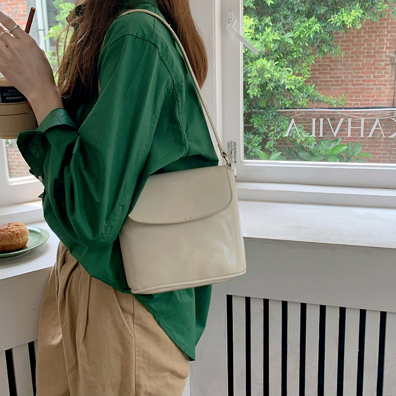 Off White Solid One Handle Sling Bag