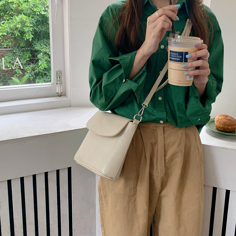 Off White Solid One Handle Sling Bag