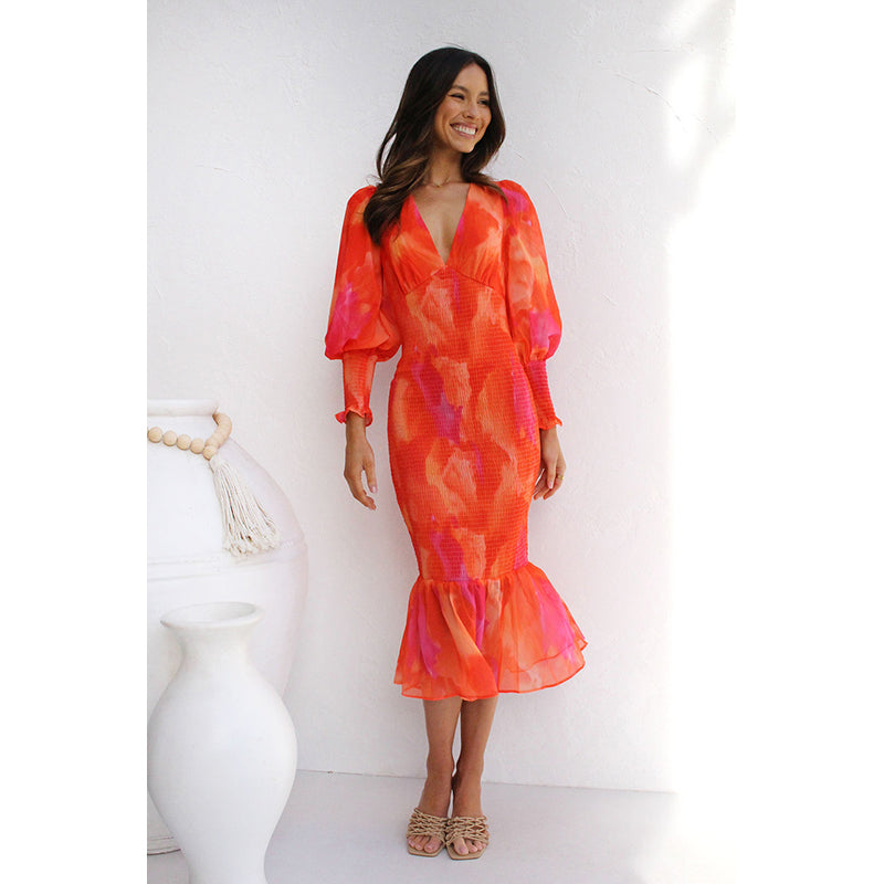 Orange Abstract Printed cuffed Sleeve Ruffled Sheath Midi Dress