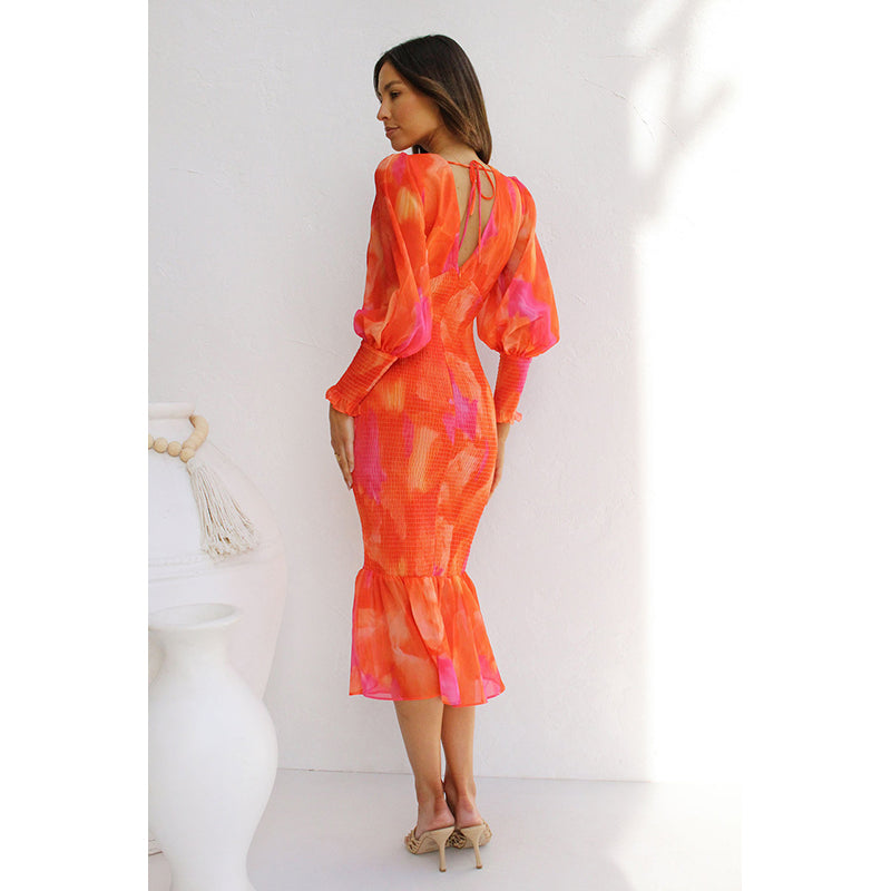 Orange Abstract Printed cuffed Sleeve Ruffled Sheath Midi Dress