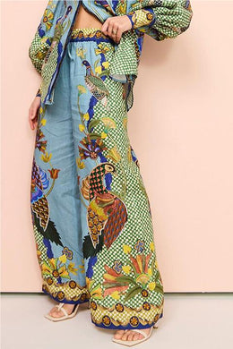 Women Green Ethnic Motifs Printed Loose Fit Wrinkle Free Parallel Trousers