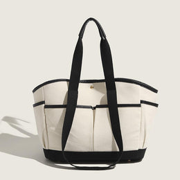 Women Solid Structured Handheld Bag