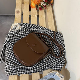 Women Textured Swagger Sling Bag