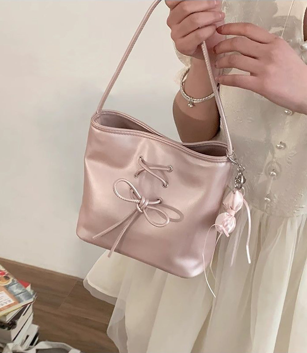 Women Solid Structured Handheld Bag