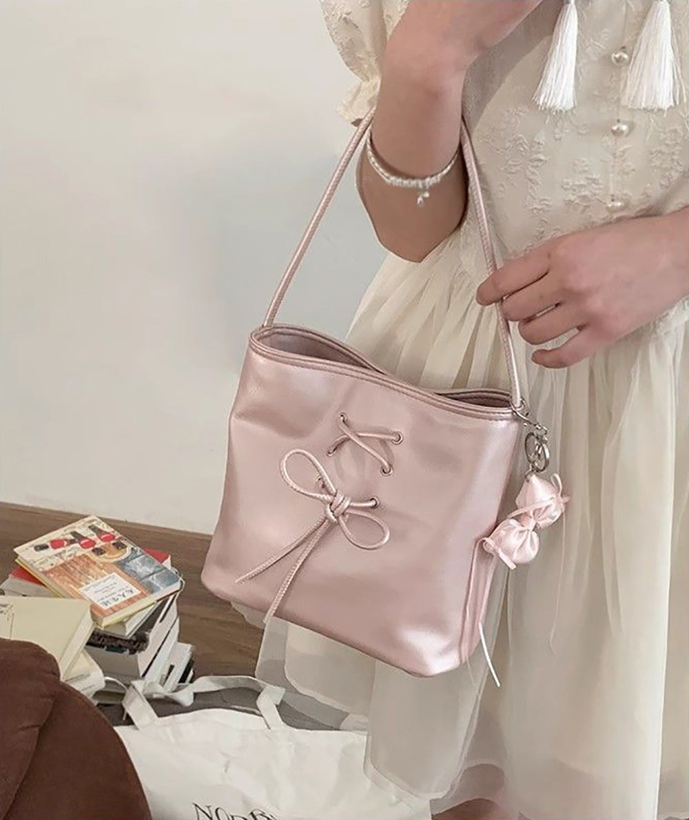 Women Solid Structured Handheld Bag