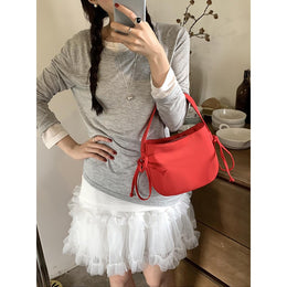 Women Solid Structured Handheld Bag